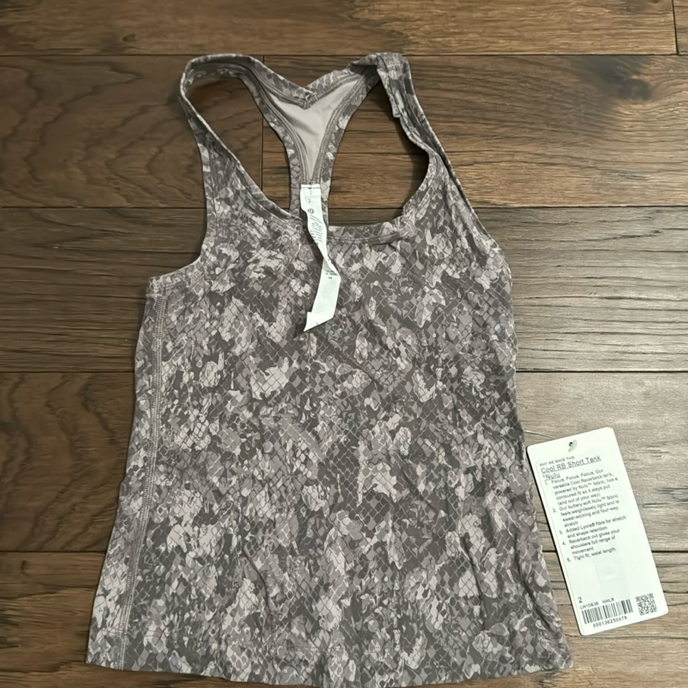 Brand new cool RB short tank. Nulu fabric. Size 2